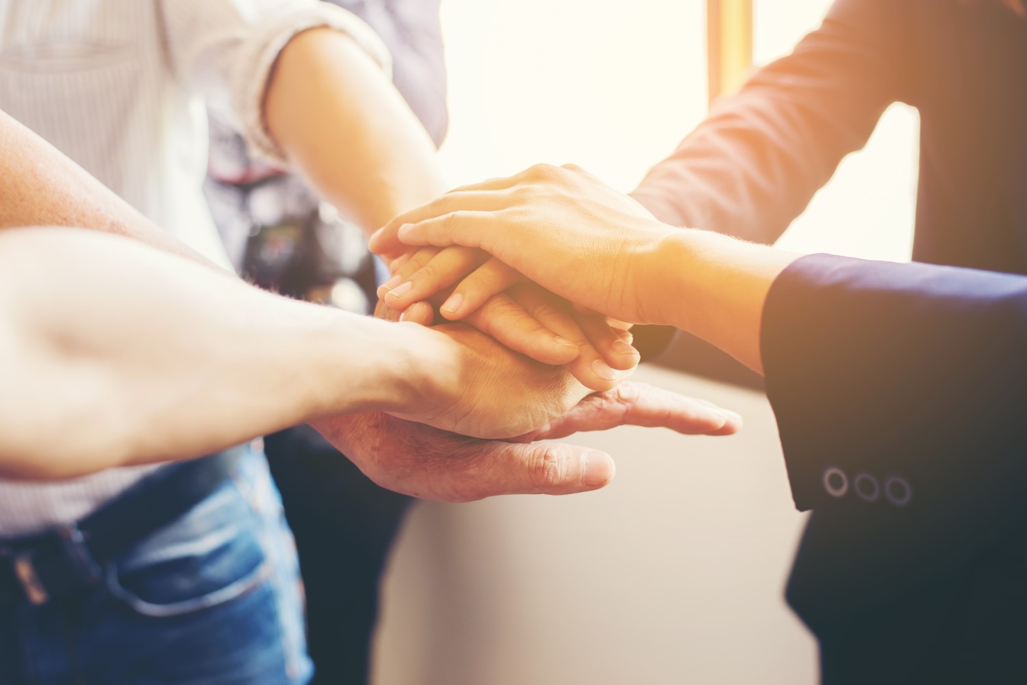 hands-joined-by-team